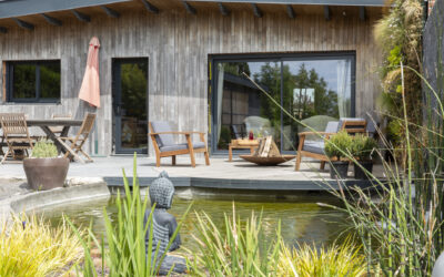 Aménagement de terrasse à Fretin : bois ou pierre naturelle, quel revêtement choisir ?